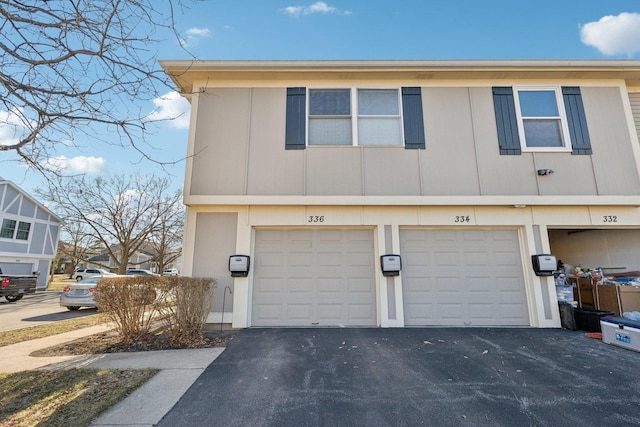 view of front of house with driveway and an attached garage