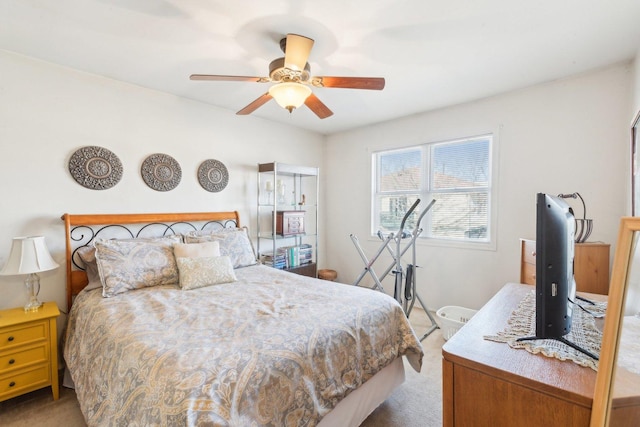 carpeted bedroom with a ceiling fan