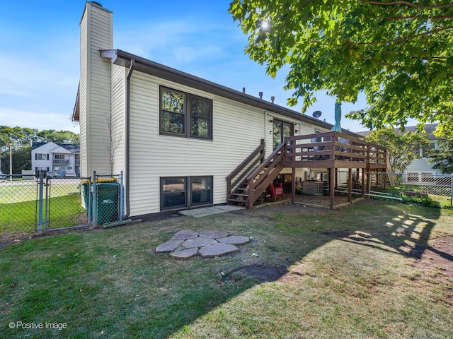 644 Swan Dr, Grayslake, IL 60030 - rear view of house featuring fence, stairway, a deck, a yard, and a gate