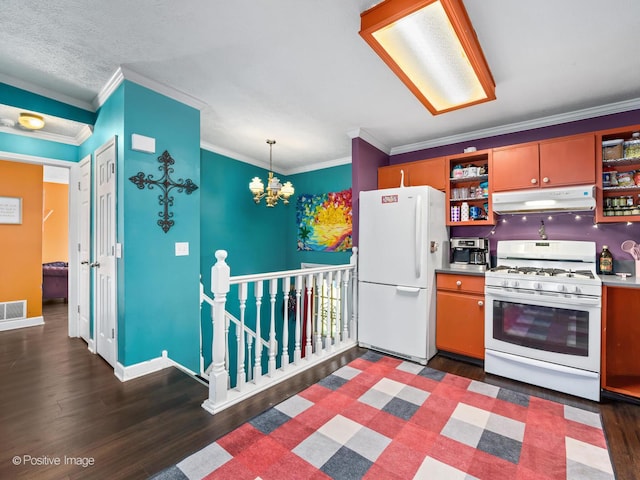 644 Swan Dr, Grayslake, IL 60030 - kitchen featuring dark wood-type flooring, a notable chandelier, under cabinet range hood, open shelves, and white appliances