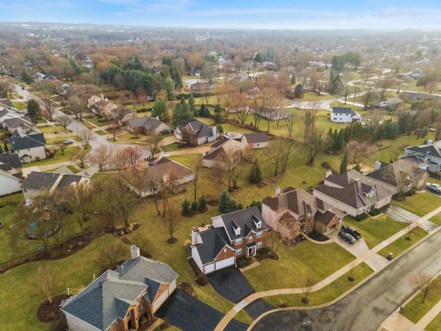 birds eye view of property with a residential view