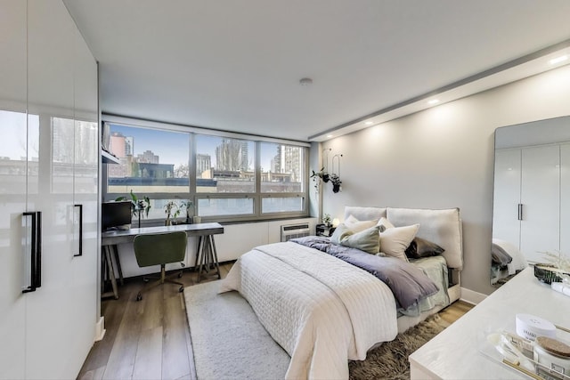 bedroom featuring wood finished floors