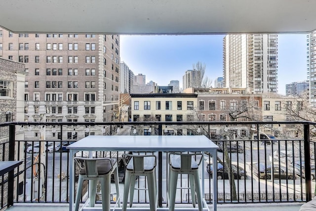 balcony featuring a view of city