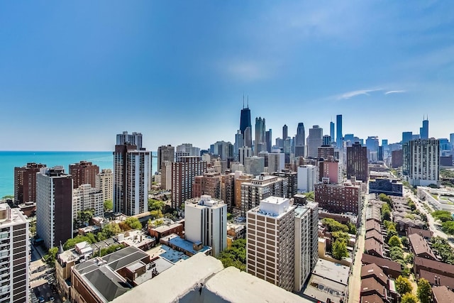 property's view of city with a water view