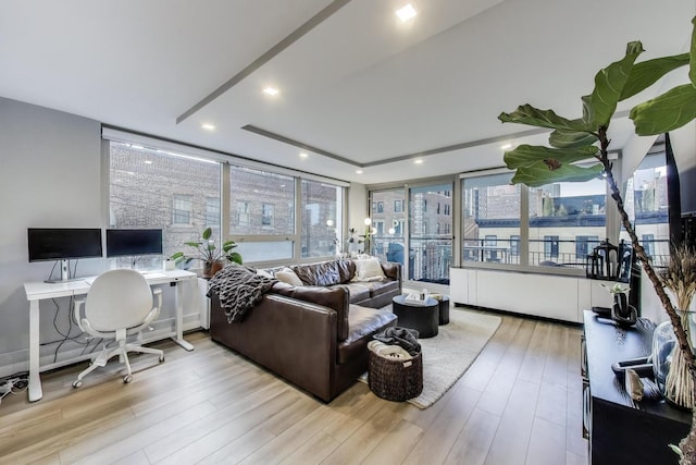 living area featuring light wood-style flooring