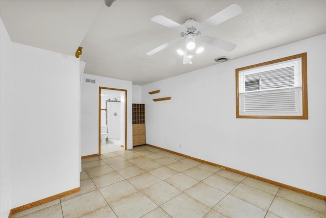 504 N 4th St, Saint Joseph, IL 61873 - unfurnished room featuring baseboards, ceiling fan, and light tile patterned flooring