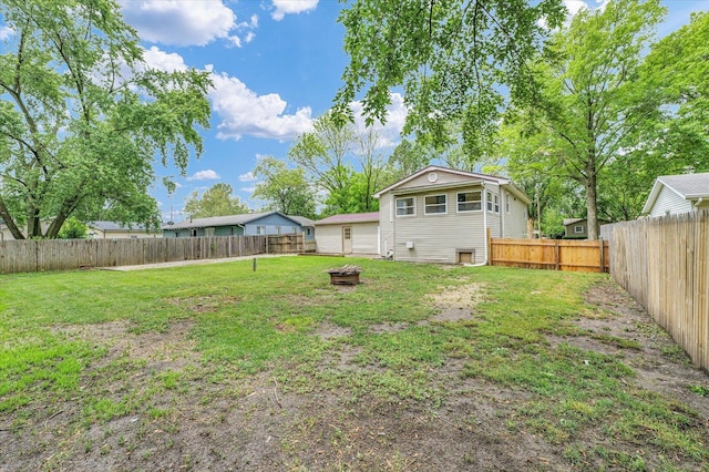 504 N 4th St, Saint Joseph, IL 61873 - view of yard with an outdoor fire pit