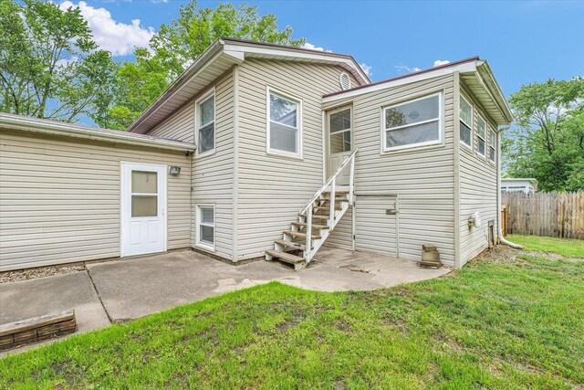 504 N 4th St, Saint Joseph, IL 61873 - rear view of house featuring a patio area