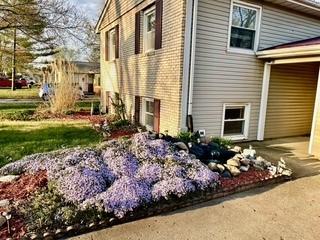 504 N 4th St, Saint Joseph, IL 61873 - view of property exterior featuring brick siding