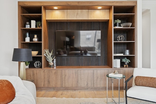 3951 N Wayne Ave Unit 404, Chicago, IL 60613 - living area featuring built in shelves and wood finished floors