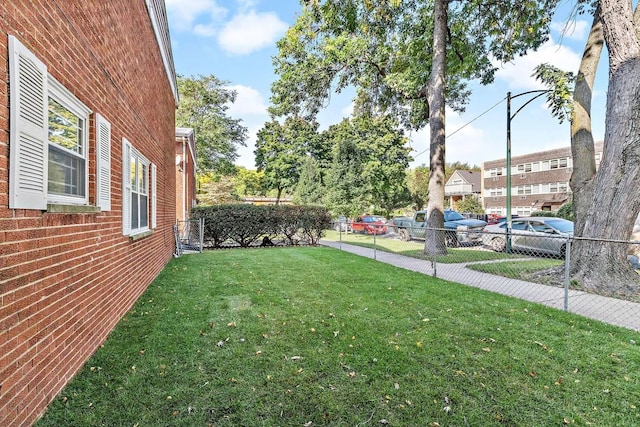 view of yard featuring fence