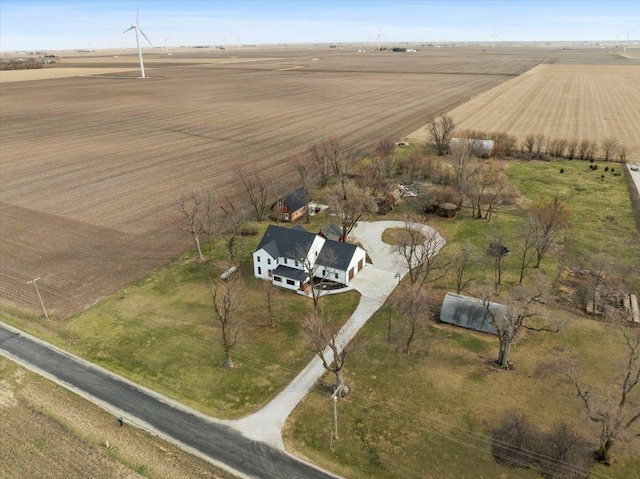 aerial view of property and surrounding area featuring rural landscape