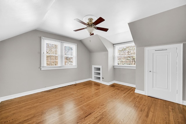 2242 Macdonald Ln, Flossmoor, IL 60422 - bonus room featuring baseboards, ceiling fan, vaulted ceiling, and light wood-style flooring
