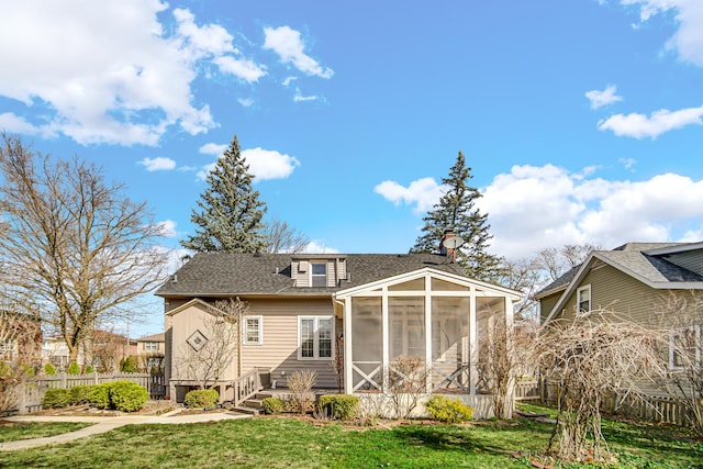 2242 Macdonald Ln, Flossmoor, IL 60422 - back of house with a lawn, roof with shingles, fence, and a sunroom