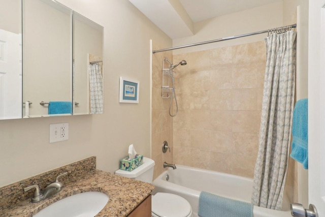 bathroom with shower / bathtub combination with curtain, toilet, and vanity