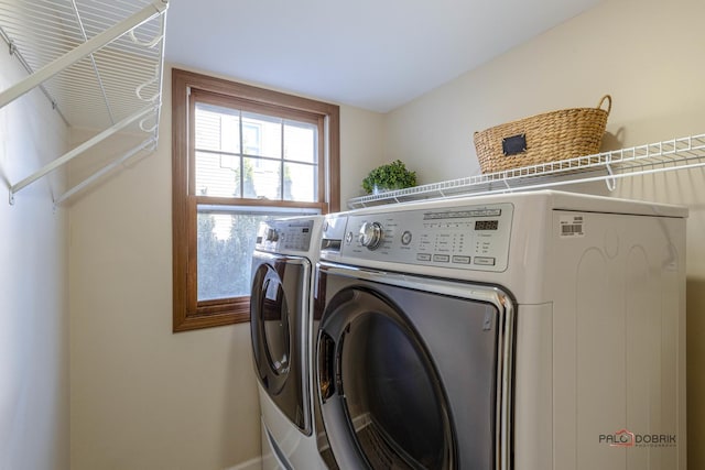 laundry room with laundry area and washer and dryer