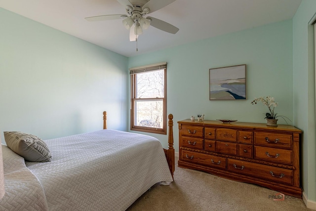 bedroom featuring carpet flooring and a ceiling fan