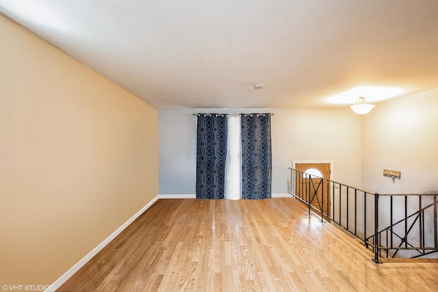350 E Tulip Dr, Glenwood, IL 60425 - unfurnished room with baseboards and wood finished floors