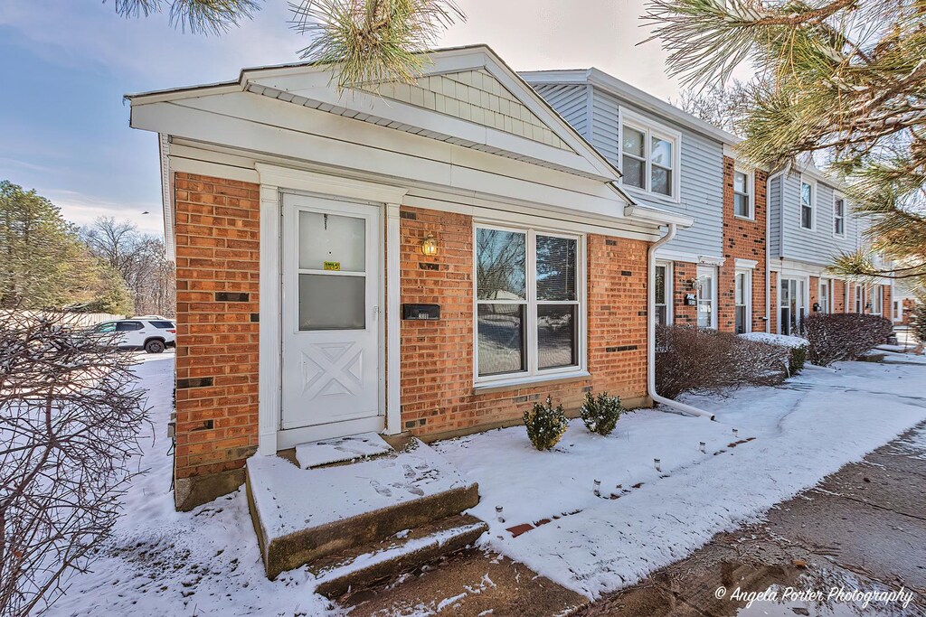 2011 Duxbury Ct Unit 2011, Streamwood, IL 60107 - view of front of house featuring brick siding