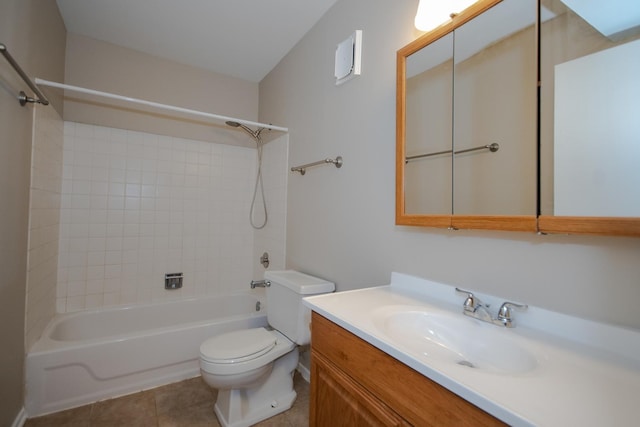 bathroom with toilet, tile patterned flooring, vanity, and washtub / shower combination