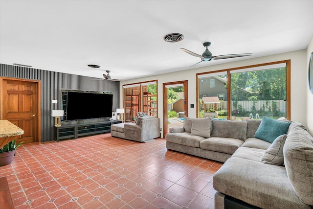 615 Haines Blvd, Champaign, IL 61820 - living room with visible vents, ceiling fan, and an accent wall