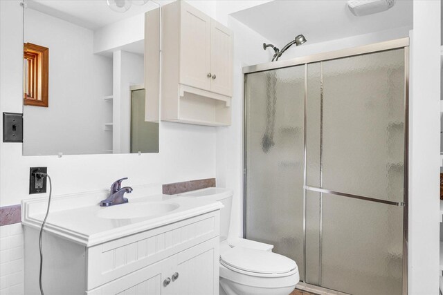 615 Haines Blvd, Champaign, IL 61820 - bathroom with a shower stall, vanity, and toilet