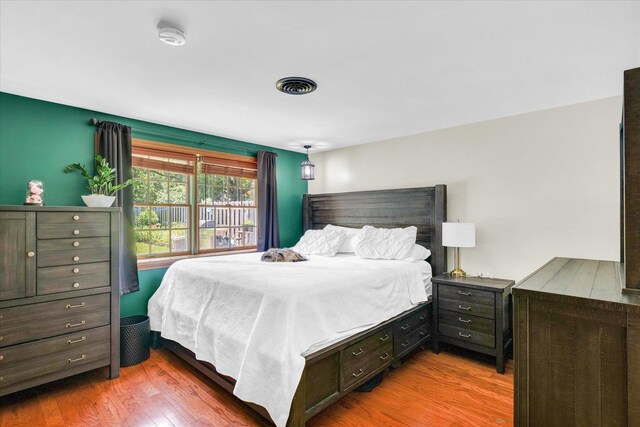 615 Haines Blvd, Champaign, IL 61820 - bedroom featuring visible vents and wood finished floors