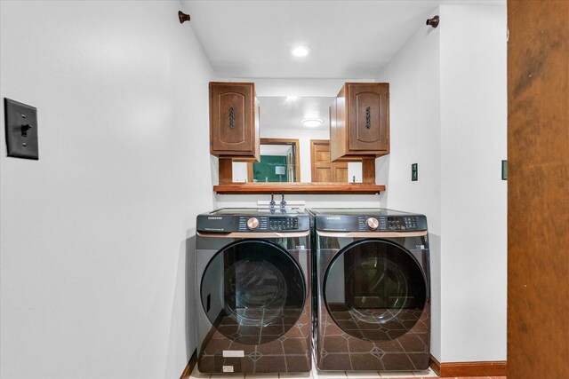 615 Haines Blvd, Champaign, IL 61820 - laundry room with recessed lighting, washer and clothes dryer, baseboards, and cabinet space