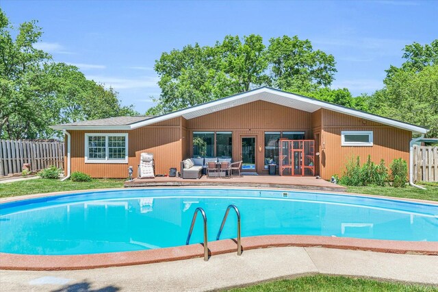 615 Haines Blvd, Champaign, IL 61820 - view of swimming pool featuring fence, a fenced in pool, and an outdoor hangout area