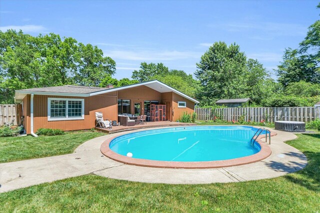 615 Haines Blvd, Champaign, IL 61820 - view of pool with a fenced in pool, a yard, a wooden deck, and fence