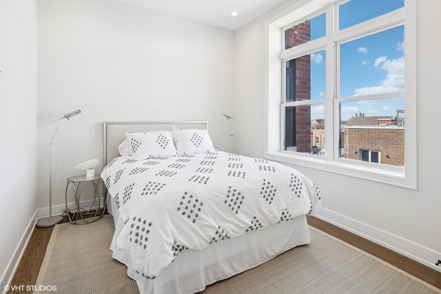 1938 W Augusta Blvd Unit 504, Chicago, IL 60622 - bedroom featuring wood finished floors, baseboards, and recessed lighting