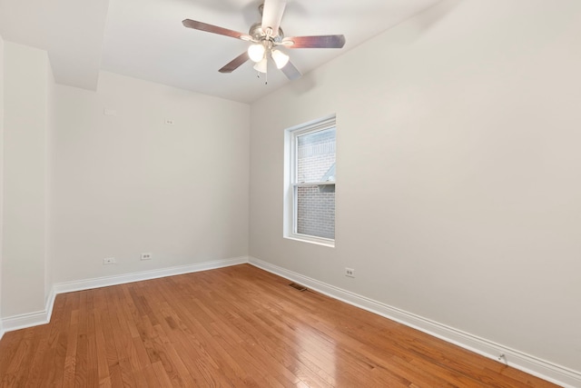 7559 S Michigan Ave, Chicago, IL 60619 - spare room with baseboards, light wood-style flooring, and ceiling fan