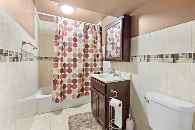 7559 S Michigan Ave, Chicago, IL 60619 - bathroom with vanity, shower / tub combo, toilet, tile patterned flooring, and tile walls