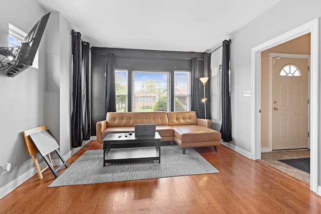 7559 S Michigan Ave, Chicago, IL 60619 - living room with plenty of natural light, wood finished floors, and baseboards