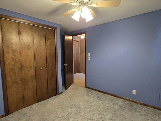 40 166th Pl, Calumet City, IL 60409 - unfurnished bedroom with a closet, light carpet, baseboards, and a ceiling fan