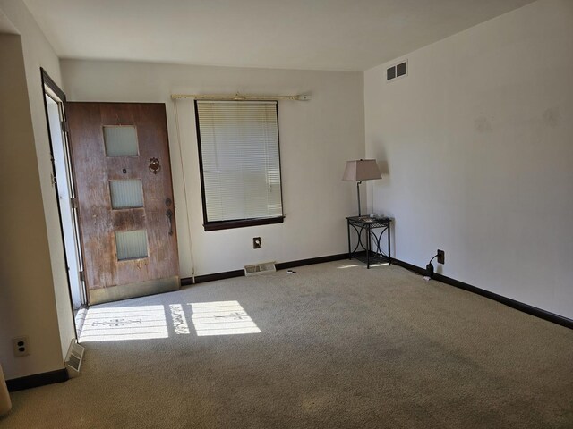 40 166th Pl, Calumet City, IL 60409 - carpeted empty room featuring baseboards and visible vents