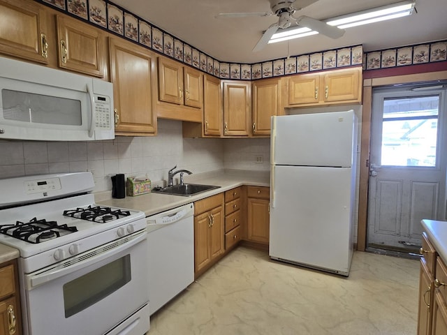 40 166th Pl, Calumet City, IL 60409 - kitchen featuring light countertops, marble finish floor, white appliances, a ceiling fan, and a sink