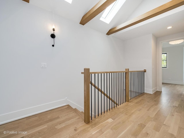 2141 W Grace St, Chicago, IL 60618 - hallway featuring a skylight, an upstairs landing, wood finished floors, and recessed lighting