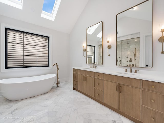 2141 W Grace St, Chicago, IL 60618 - full bathroom featuring a skylight, a marble finish shower, double vanity, a soaking tub, and high vaulted ceiling