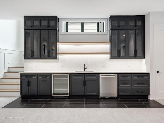 2141 W Grace St, Chicago, IL 60618 - bar area with wine cooler, dishwasher, tasteful backsplash, wainscoting, and dark tile patterned flooring