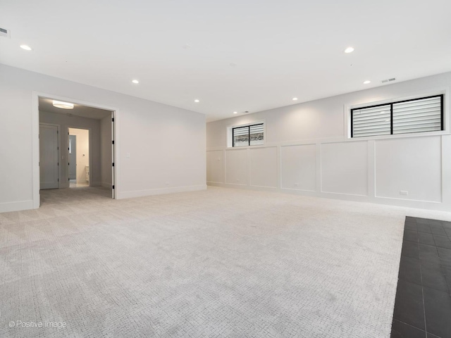 2141 W Grace St, Chicago, IL 60618 - unfurnished room with recessed lighting and light colored carpet