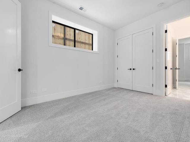 2141 W Grace St, Chicago, IL 60618 - unfurnished bedroom featuring carpet floors and baseboards