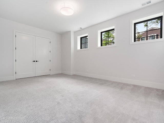 2141 W Grace St, Chicago, IL 60618 - carpeted empty room featuring baseboards