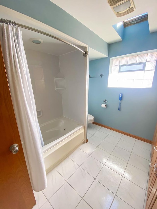 full bath featuring shower / tub combo, visible vents, baseboards, and toilet