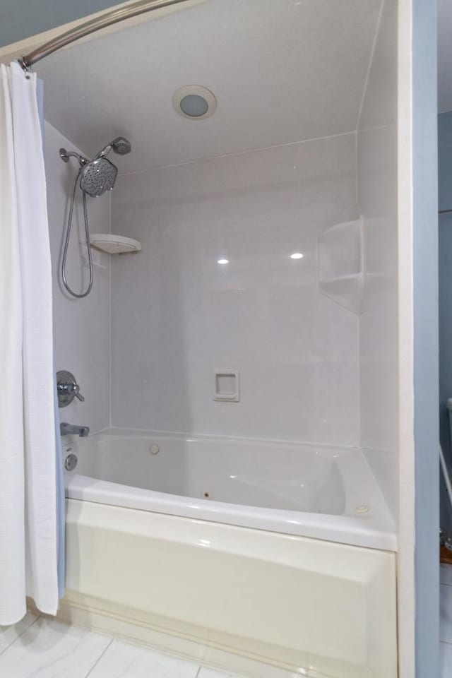 full bathroom with shower / tub combo