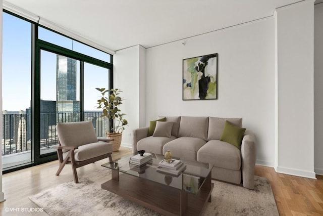 225 N Columbus Dr Unit 5703, Chicago, IL 60601 - living area with expansive windows, plenty of natural light, wood finished floors, and baseboards