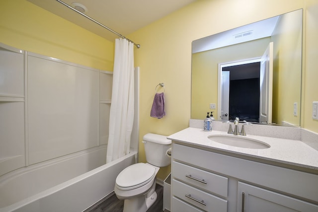 bathroom with vanity, shower / bath combination with curtain, toilet, and visible vents