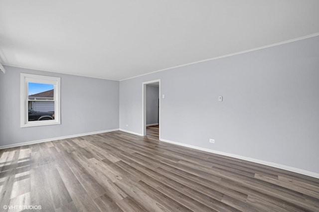 236 Indianwood Blvd, Park Forest, IL 60466 - spare room featuring crown molding, heating unit, wood finished floors, baseboards, and a wall mounted AC