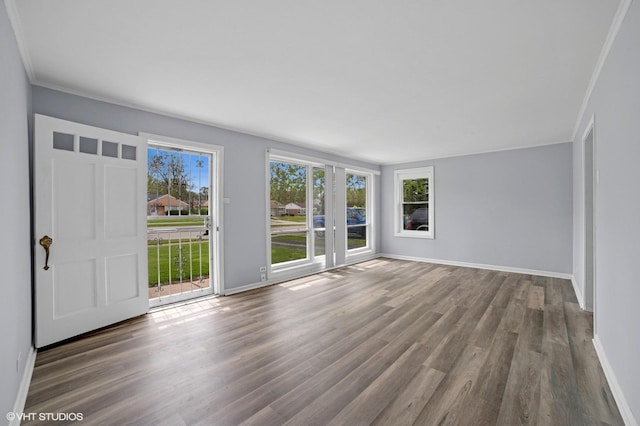 236 Indianwood Blvd, Park Forest, IL 60466 - entryway with baseboards, ornamental molding, and dark wood finished floors