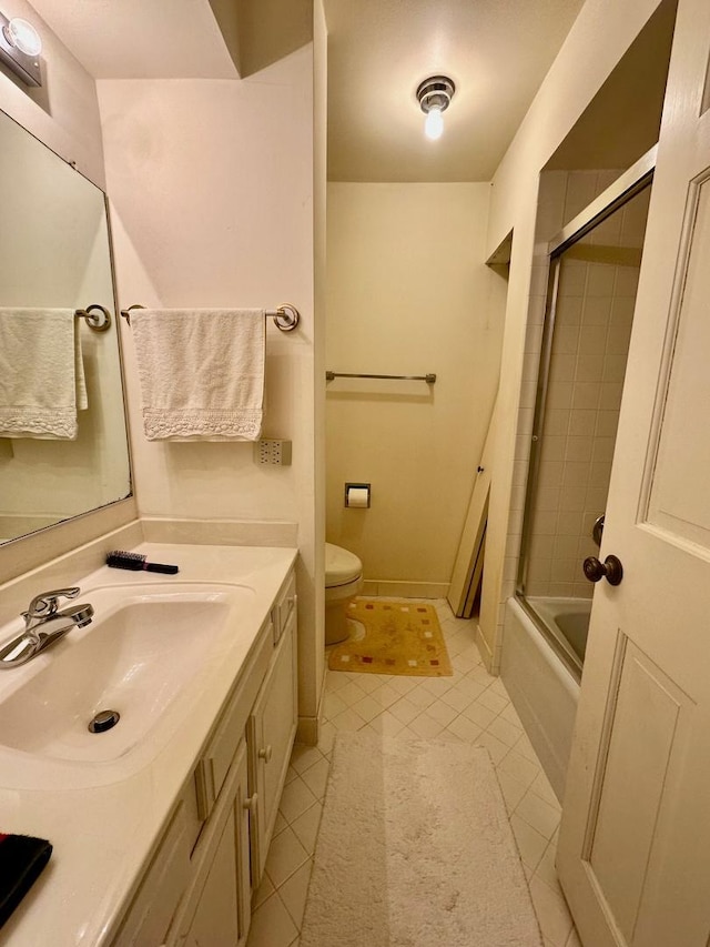 1927 Mission Hills Ln, Northbrook, IL 60062 - bathroom with toilet, tile patterned floors, vanity, and tub / shower combination